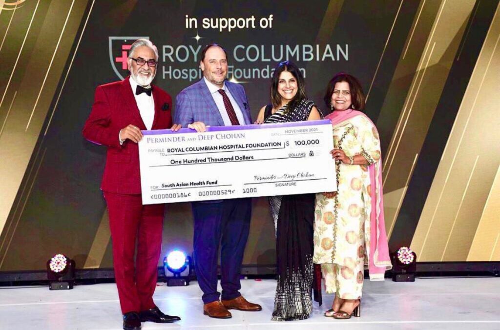 Perminder and Deep Chohan presenting a cheque to Royal Columbian Hospital Foundation