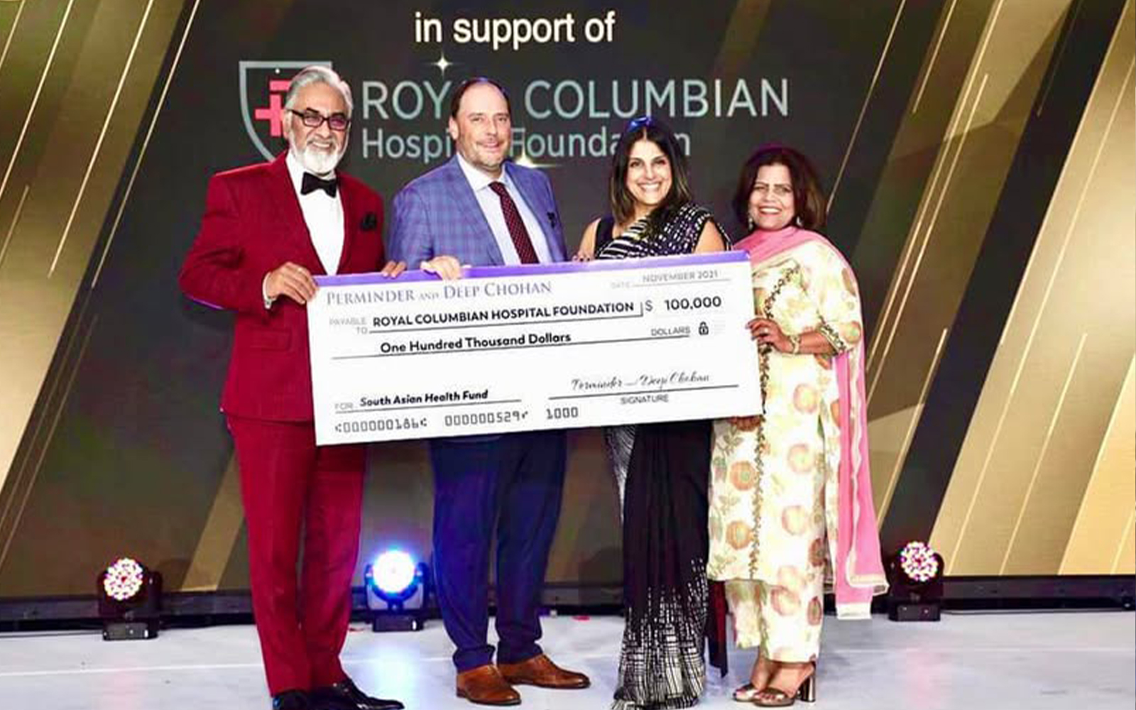 Perminder and Deep Chohan presenting $100,000 to the Royal Columbian Hospital Foundation