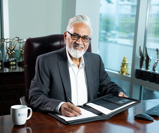 Perminder Chohan at his desk at Lifewise Financial Group